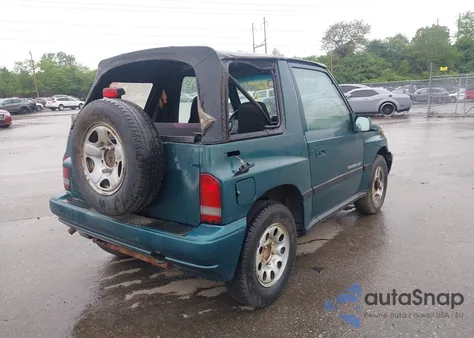 1996 Geo Tracker из США, поврежденный, VIN 2CNBJ1860T6910906